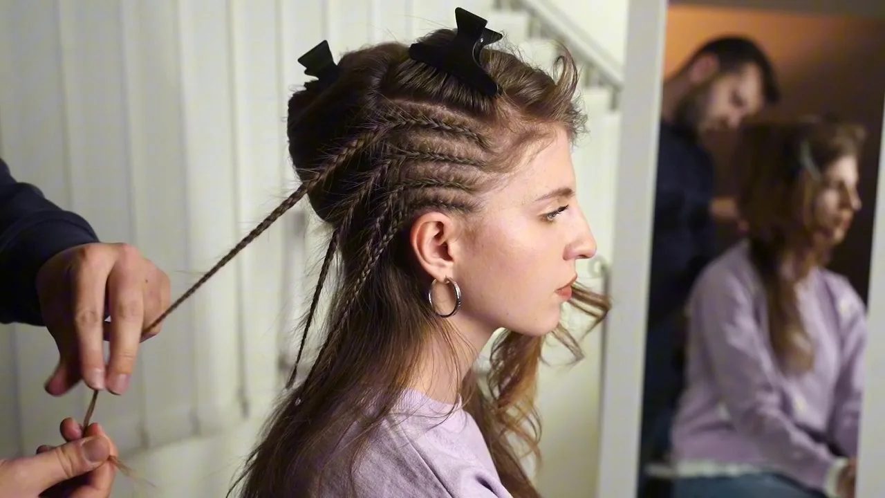 Keep repeating slim braids in the same direction until the smaller panel is full and the first layer is visible.