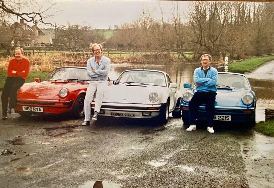 Men next to cars