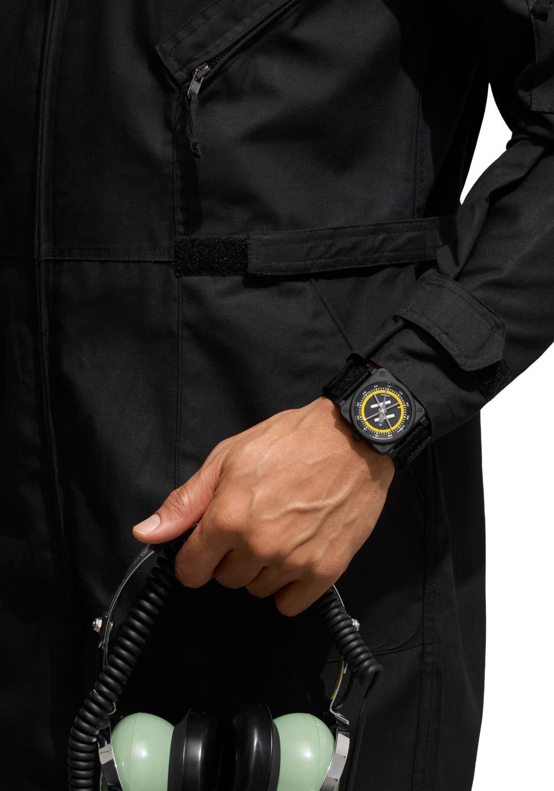 The yellow rubber strap is the one to wear first